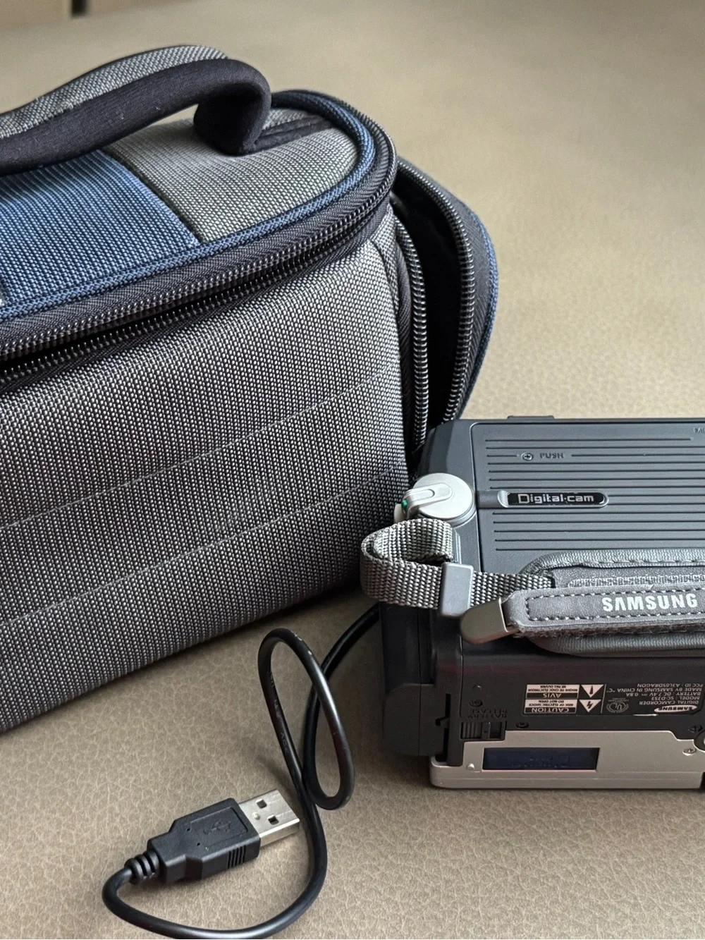 Samsung Silver Digital Camcorder with Gray and Blue Carry Case